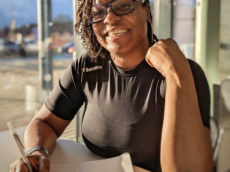 "Sophia providing a one-to-one menopause wellness consultation in a bright space."