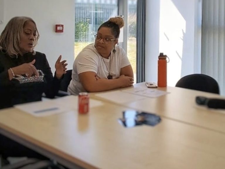 "Women discussing menopause support options within the full wellness services."